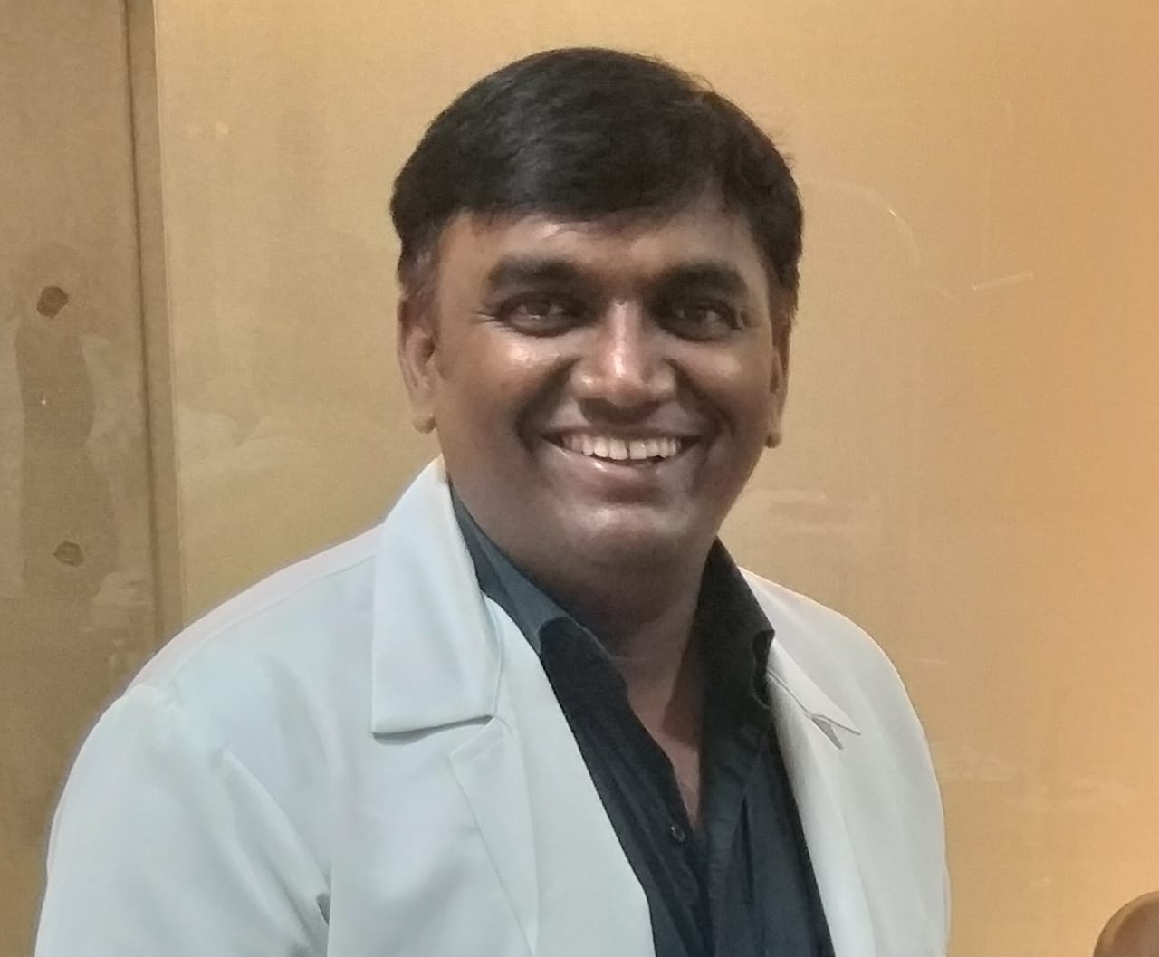 Dr. PRADEEP